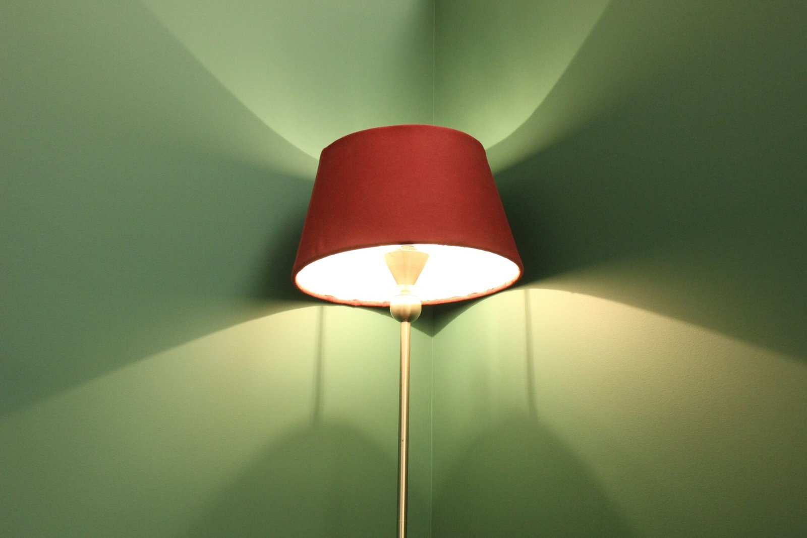 A lamp that is on in a room